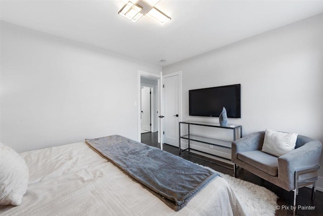 4846 W Roscoe St, Chicago, IL 60641 - bedroom featuring wood finished floors and baseboards