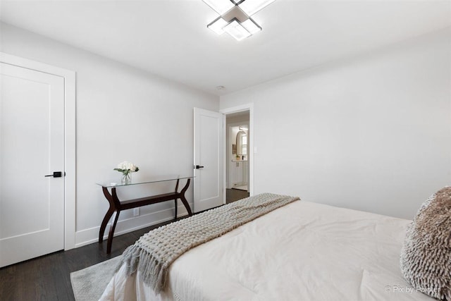 4846 W Roscoe St, Chicago, IL 60641 - bedroom featuring wood finished floors and baseboards