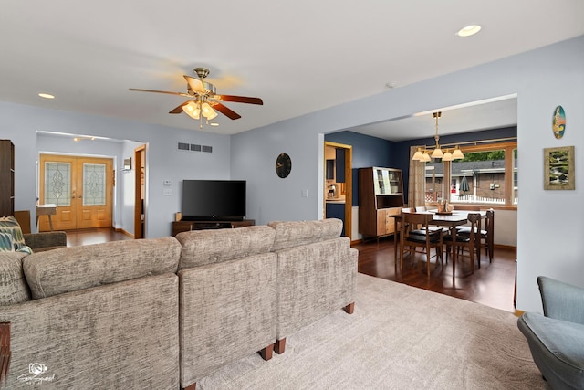 1245 W Lotus Ln, Kankakee, IL 60901 - living room with a chandelier, recessed lighting, wood finished floors, ceiling fan, and french doors