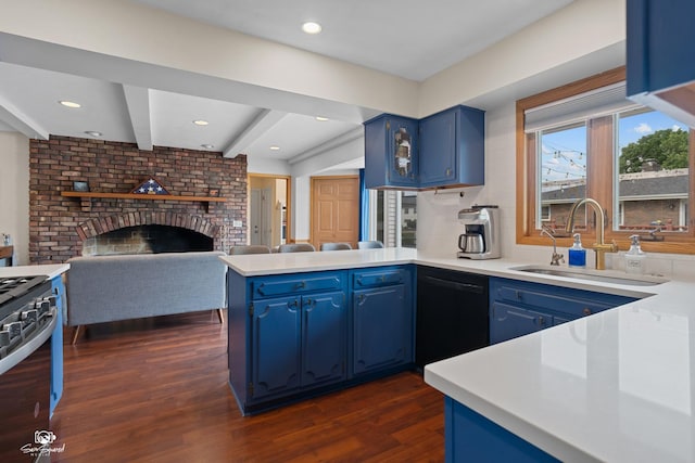 1245 W Lotus Ln, Kankakee, IL 60901 - kitchen with blue cabinetry, black dishwasher, a peninsula, dark wood-style floors, and a sink