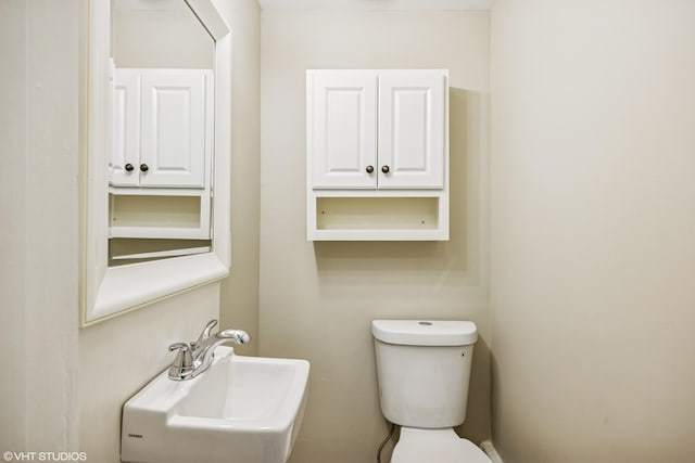 1310 Larkin Ave, Elgin, IL 60123 - half bath featuring a sink and toilet