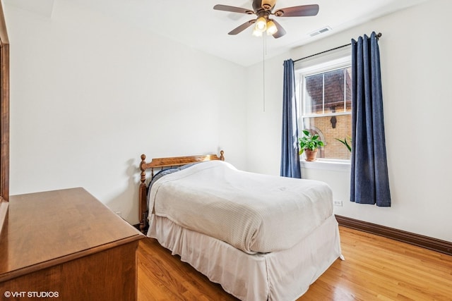 4337 N Troy St Unit 3W, Chicago, IL 60618 - bedroom featuring wood finished floors, baseboards, and ceiling fan