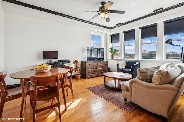 4337 N Troy St Unit 3W, Chicago, IL 60618 - living area featuring a ceiling fan, light wood-type flooring, and ornamental molding