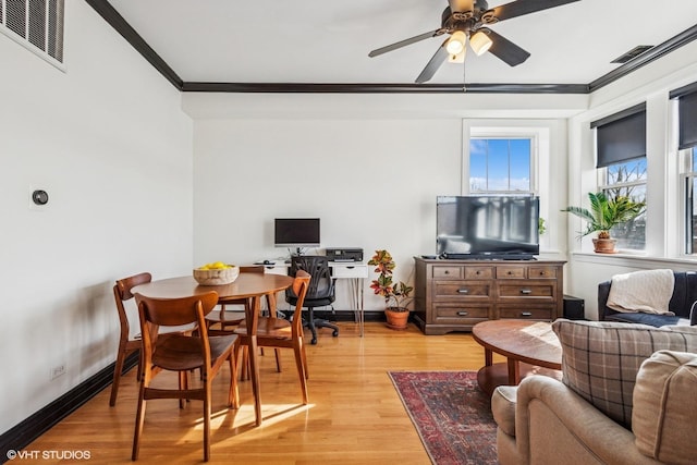 4337 N Troy St Unit 3W, Chicago, IL 60618 - living area with crown molding, a ceiling fan, light wood-style floors, and baseboards