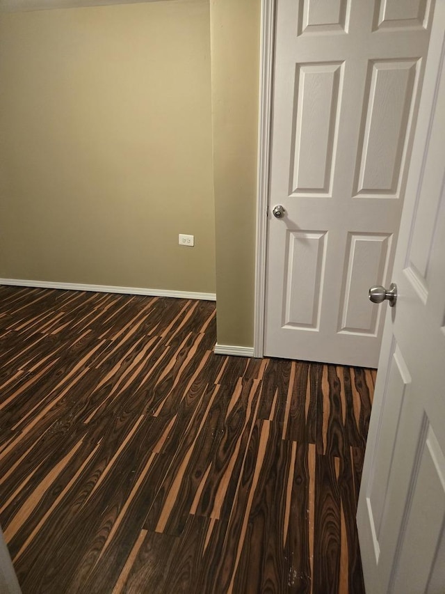 17506 Bernadine St, Lansing, IL 60438 - empty room with wood finished floors and baseboards
