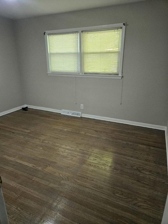 17506 Bernadine St, Lansing, IL 60438 - unfurnished room with baseboards and dark wood finished floors