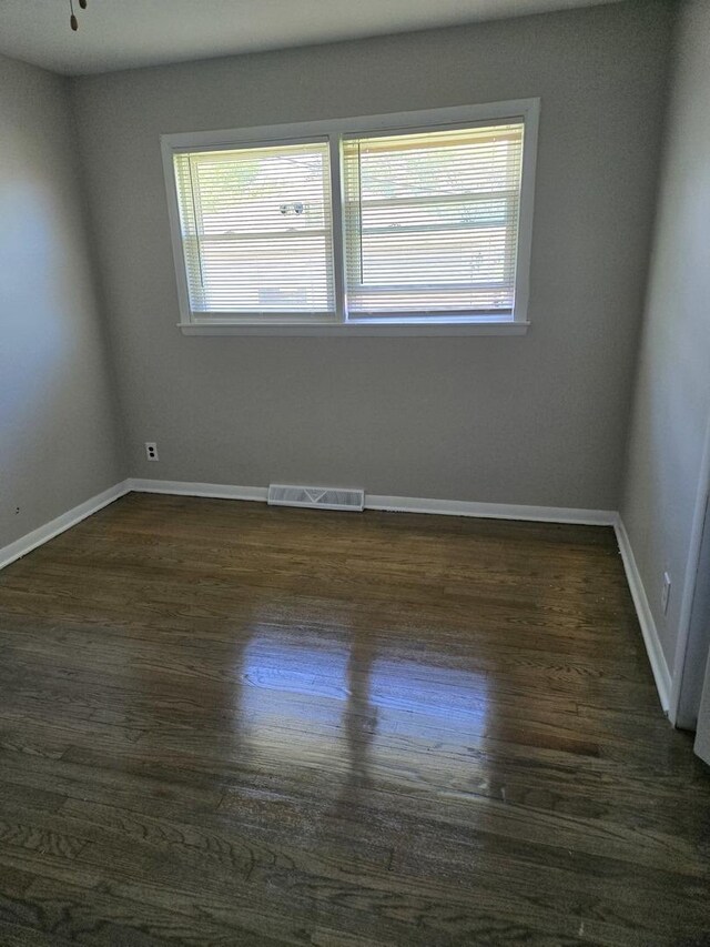 17506 Bernadine St, Lansing, IL 60438 - unfurnished room featuring dark wood-type flooring and baseboards