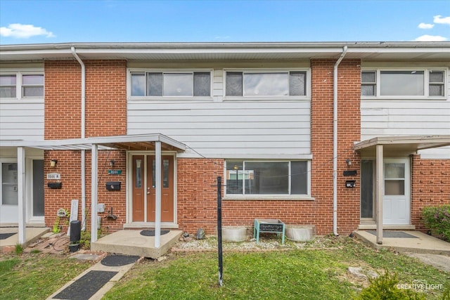 8044 W Lyons St Unit B, Niles, IL 60714 - view of property featuring brick siding