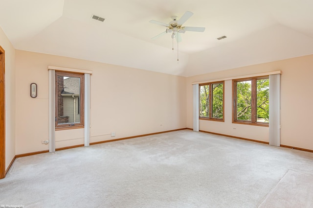 18633 Swan Dr, Mokena, IL 60448 - unfurnished room featuring plenty of natural light, light carpet, vaulted ceiling, and baseboards