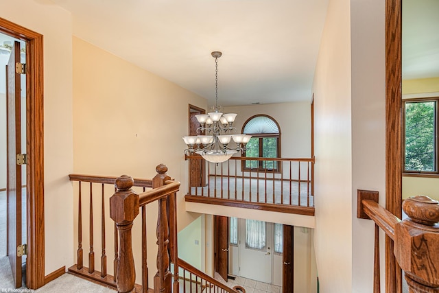 18633 Swan Dr, Mokena, IL 60448 - staircase featuring a chandelier and baseboards