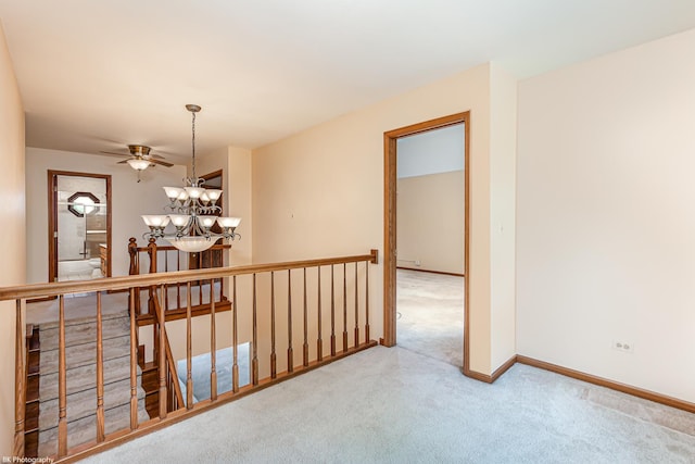 18633 Swan Dr, Mokena, IL 60448 - hall featuring carpet, a chandelier, an upstairs landing, and baseboards