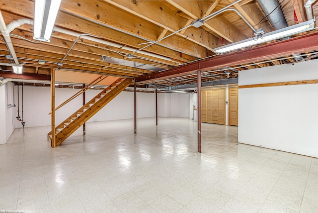 18633 Swan Dr, Mokena, IL 60448 - unfinished basement featuring tile patterned floors and stairs