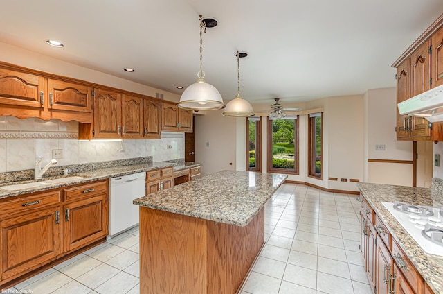 18633 Swan Dr, Mokena, IL 60448 - kitchen with white appliances, brown cabinetry, light tile patterned floors, and recessed lighting