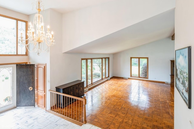 69 Graymoor Ln, Olympia Fields, IL 60461 - entryway with high vaulted ceiling, a chandelier, and baseboards