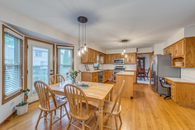 3368 Charlemaine Dr, Aurora, IL 60504 - dining room with plenty of natural light and light wood-style flooring