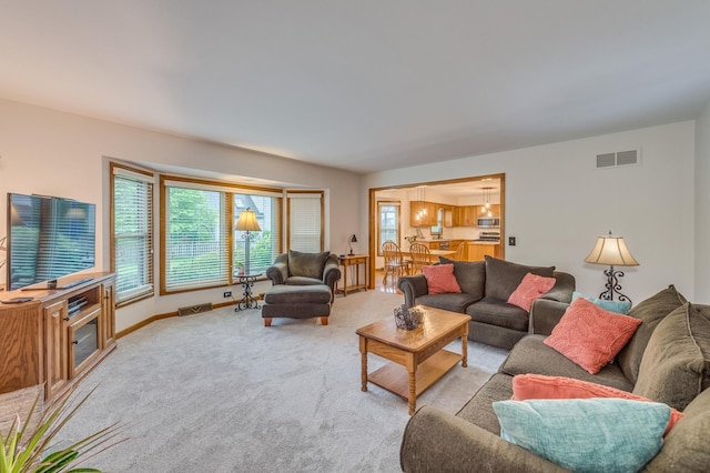 3368 Charlemaine Dr, Aurora, IL 60504 - living area with light colored carpet and baseboards