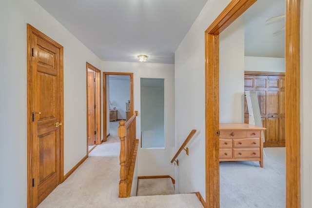 3368 Charlemaine Dr, Aurora, IL 60504 - corridor with an upstairs landing, light colored carpet, and baseboards