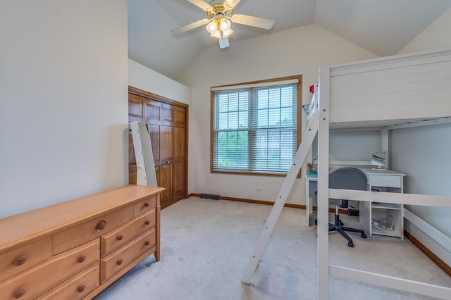 3368 Charlemaine Dr, Aurora, IL 60504 - bedroom featuring lofted ceiling, light carpet, a desk, a closet, and baseboards