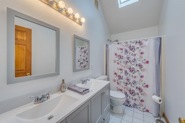 3368 Charlemaine Dr, Aurora, IL 60504 - bathroom with double vanity, toilet, tile patterned floors, lofted ceiling, and a shower with shower curtain