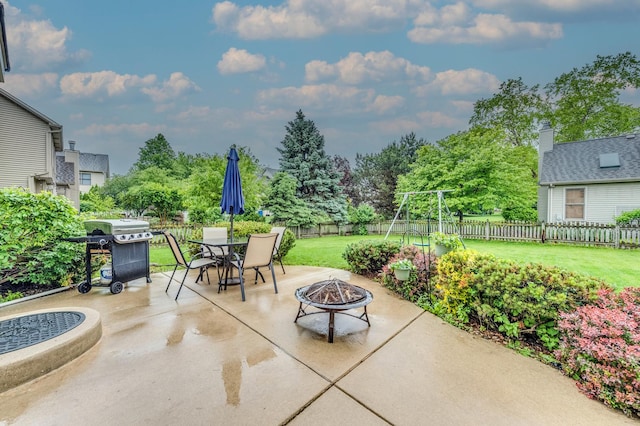 3368 Charlemaine Dr, Aurora, IL 60504 - view of patio featuring a grill, an outdoor fire pit, and outdoor dining space