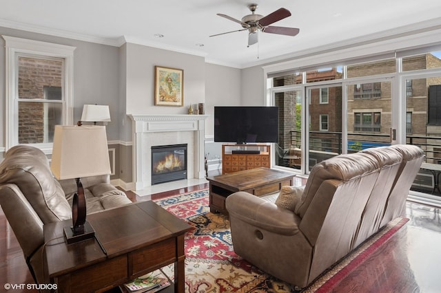 5051 N Clark St Unit 2S, Chicago, IL 60640 - living room featuring a fireplace, a ceiling fan, crown molding, and wood finished floors