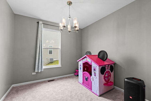 1809 Wildspring Pkwy, Joliet, IL 60431 - recreation room featuring a chandelier, baseboards, and carpet floors