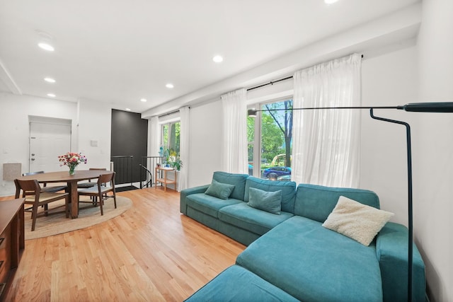 3406 W Medill Ave Unit 1, Chicago, IL 60647 - living room featuring light wood-style floors and recessed lighting
