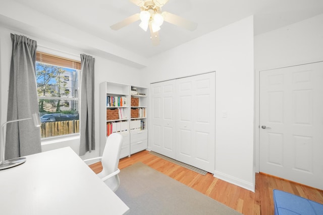 3406 W Medill Ave Unit 1, Chicago, IL 60647 - office area with light wood finished floors and ceiling fan