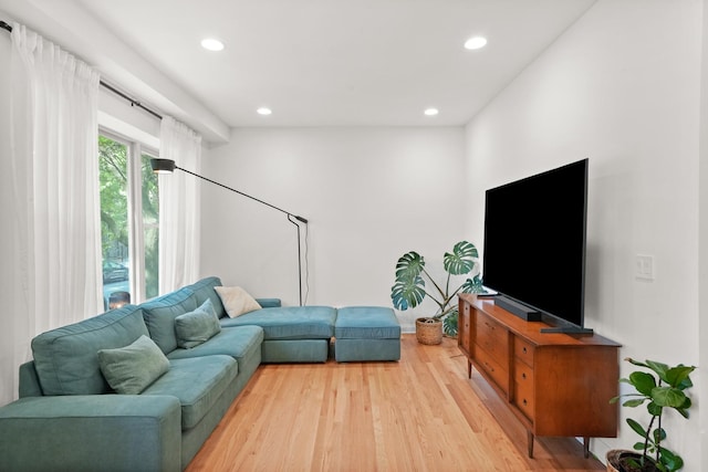 3406 W Medill Ave Unit 1, Chicago, IL 60647 - living room with recessed lighting and light wood-style floors