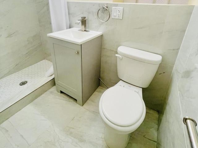 1426 N Central Park Ave, Chicago, IL 60651 - full bathroom featuring toilet, vanity, a stall shower, tile walls, and marble finish floors