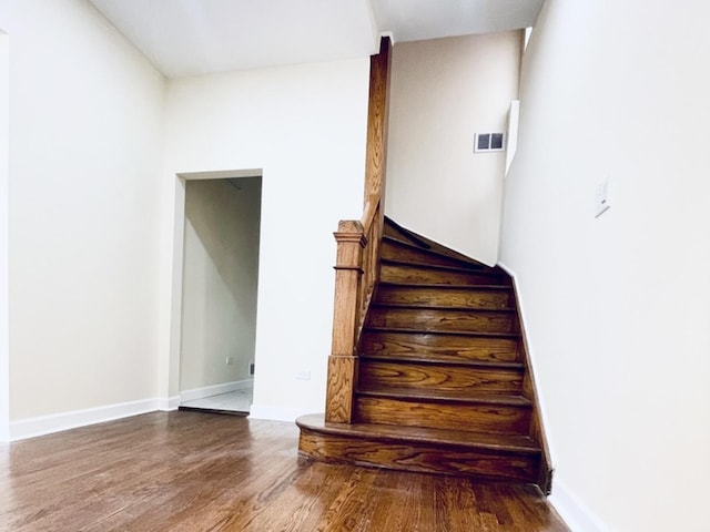 1426 N Central Park Ave, Chicago, IL 60651 - stairs with wood finished floors and baseboards
