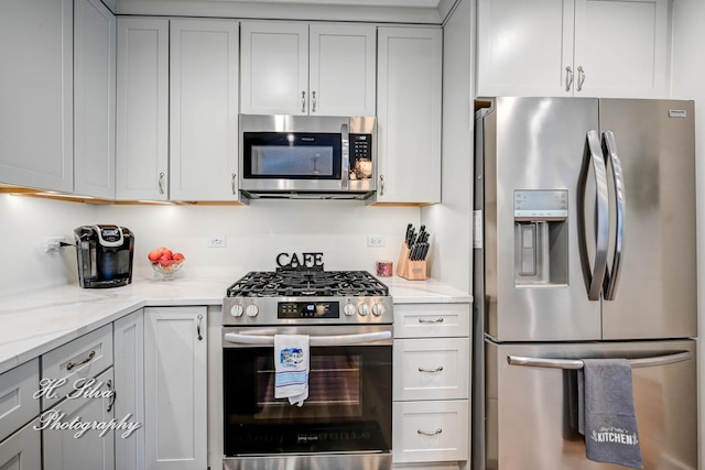 1109 Needham Rd, Naperville, IL 60563 - kitchen with appliances with stainless steel finishes, light stone counters, and gray cabinetry
