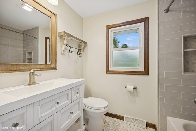 2020 Rolling Ridge Ln, Lindenhurst, IL 60046 - bathroom featuring vanity, toilet, baseboards, tile patterned floors, and bathtub / shower combination