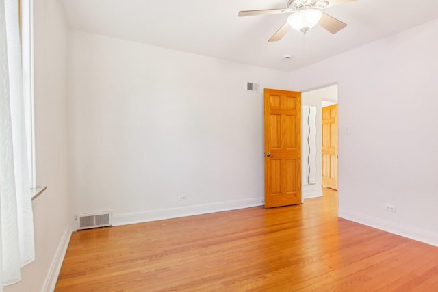 38 Northgate Rd, Riverside, IL 60546 - unfurnished room with light wood finished floors, baseboards, and ceiling fan