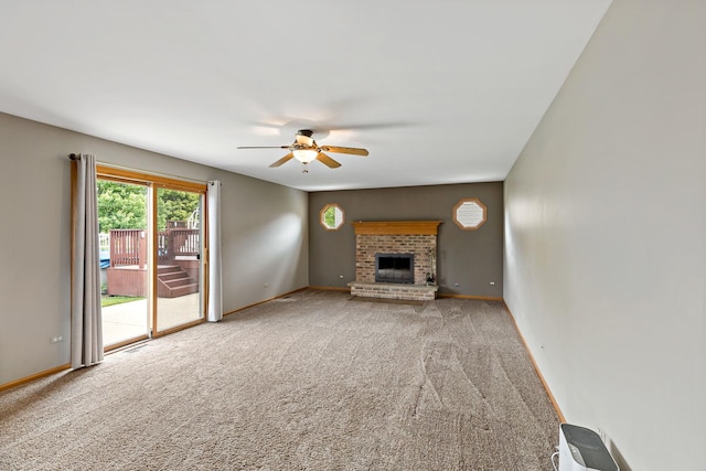 2807 Southwind Dr, New Lenox, IL 60451 - unfurnished living room featuring ceiling fan, carpet floors, a fireplace, and baseboards