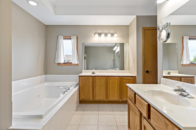 2807 Southwind Dr, New Lenox, IL 60451 - bathroom featuring two vanities, a tub with jets, and tile patterned flooring