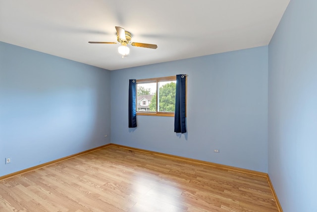 2807 Southwind Dr, New Lenox, IL 60451 - unfurnished room featuring a ceiling fan, light wood-type flooring, and baseboards