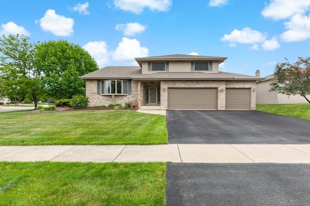 2807 Southwind Dr, New Lenox, IL 60451 - view of front of home featuring driveway, an attached garage, a front yard, and brick siding