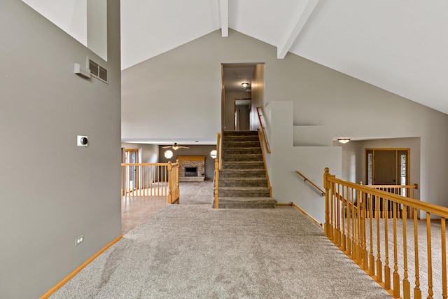 2807 Southwind Dr, New Lenox, IL 60451 - stairs with carpet, beamed ceiling, a brick fireplace, high vaulted ceiling, and baseboards
