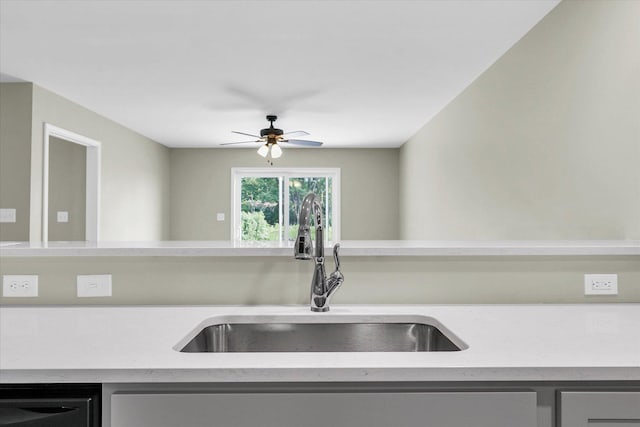 205 E Fairfield St, Fisher, IL 61843 - kitchen featuring a sink, dishwasher, light countertops, and ceiling fan