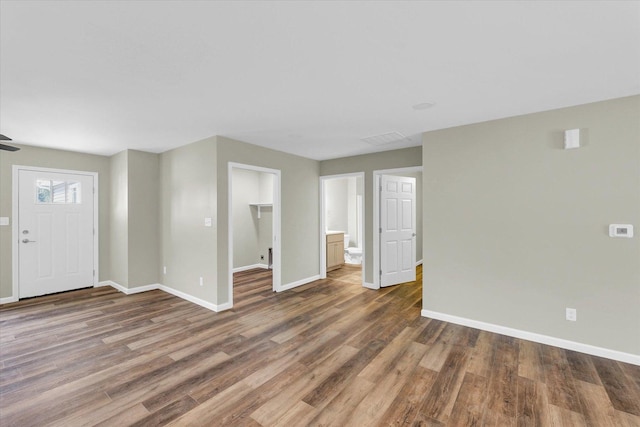 205 E Fairfield St, Fisher, IL 61843 - foyer entrance featuring baseboards and wood finished floors