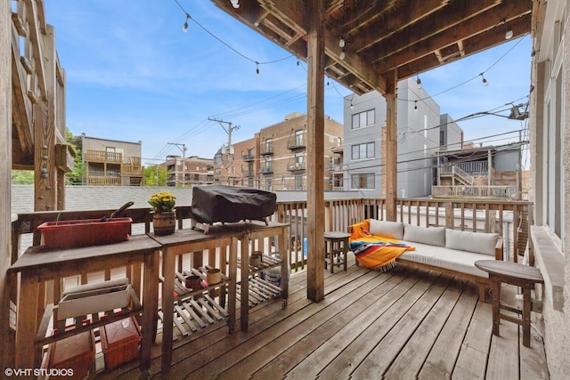 1615 N Oakley Ave Unit 2S, Chicago, IL 60647 - wooden terrace featuring area for grilling and an outdoor hangout area