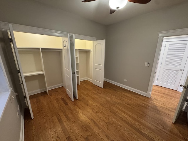 1304 N Wood St Unit 2, Chicago, IL 60622 - unfurnished bedroom featuring wood finished floors, multiple closets, baseboards, and a ceiling fan