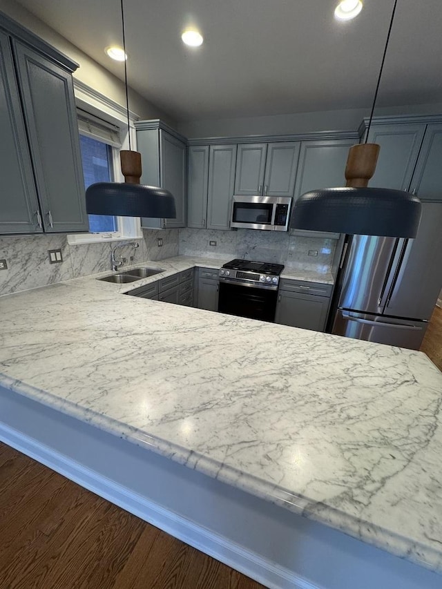 1304 N Wood St Unit 2, Chicago, IL 60622 - kitchen with appliances with stainless steel finishes, a sink, gray cabinetry, decorative backsplash, and recessed lighting