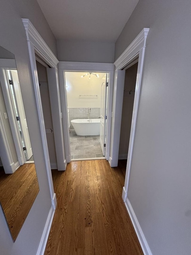 1304 N Wood St Unit 2, Chicago, IL 60622 - hallway with wood finished floors and baseboards