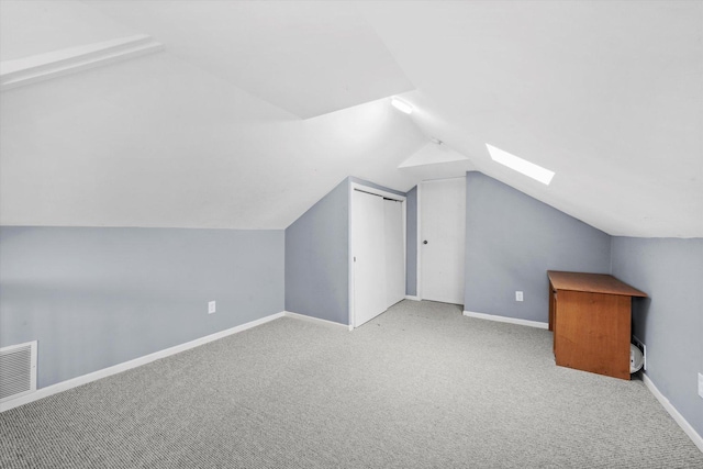 3534 Clarence Ave, Berwyn, IL 60402 - bonus room featuring a skylight, lofted ceiling, carpet flooring, and baseboards