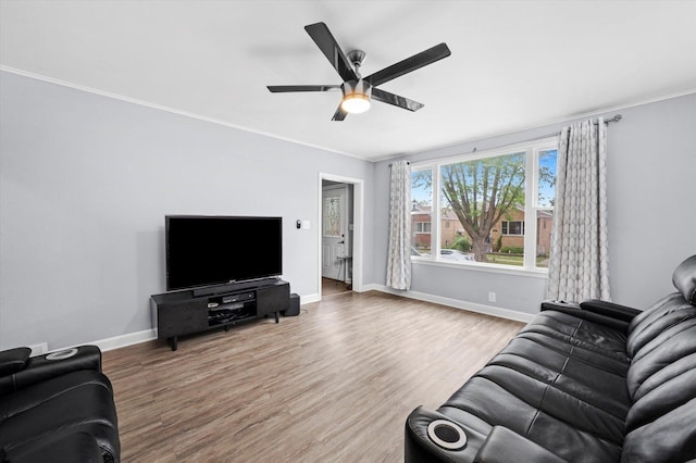 3534 Clarence Ave, Berwyn, IL 60402 - living room with ceiling fan, baseboards, wood finished floors, and crown molding