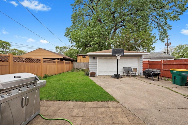 3534 Clarence Ave, Berwyn, IL 60402 - view of yard featuring a detached garage and an outbuilding
