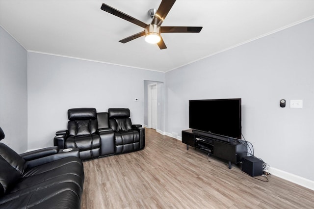 3534 Clarence Ave, Berwyn, IL 60402 - home theater room with wood finished floors, crown molding, ceiling fan, and baseboards