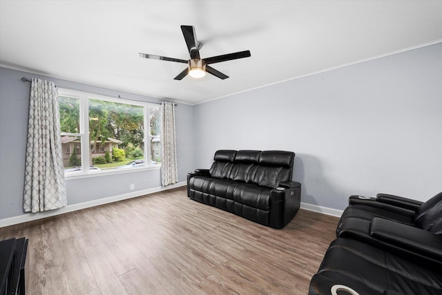3534 Clarence Ave, Berwyn, IL 60402 - living area featuring crown molding, baseboards, a ceiling fan, and wood finished floors